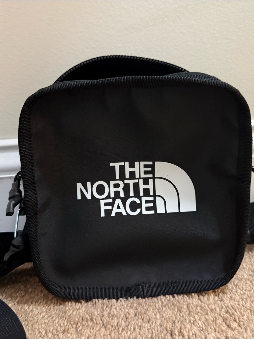 The North Face Black Mini Belt Bag with White Logo